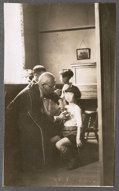 Doctors examining children